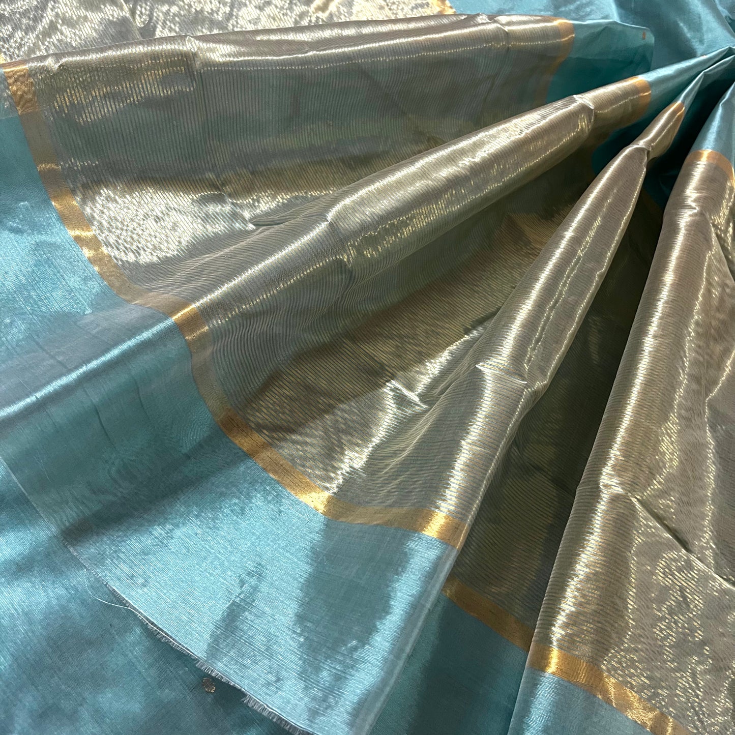 Baby blue chanderi silk saree with zari bootis all over