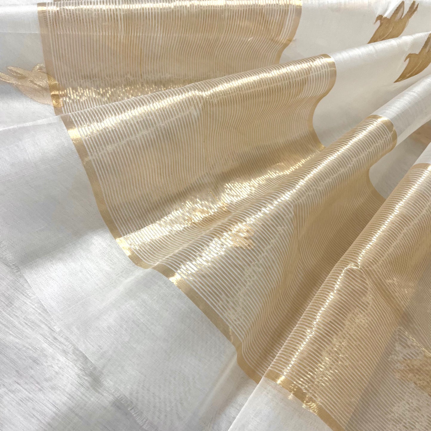Off white and gold chanderi organza silk saree with bird motifs all over