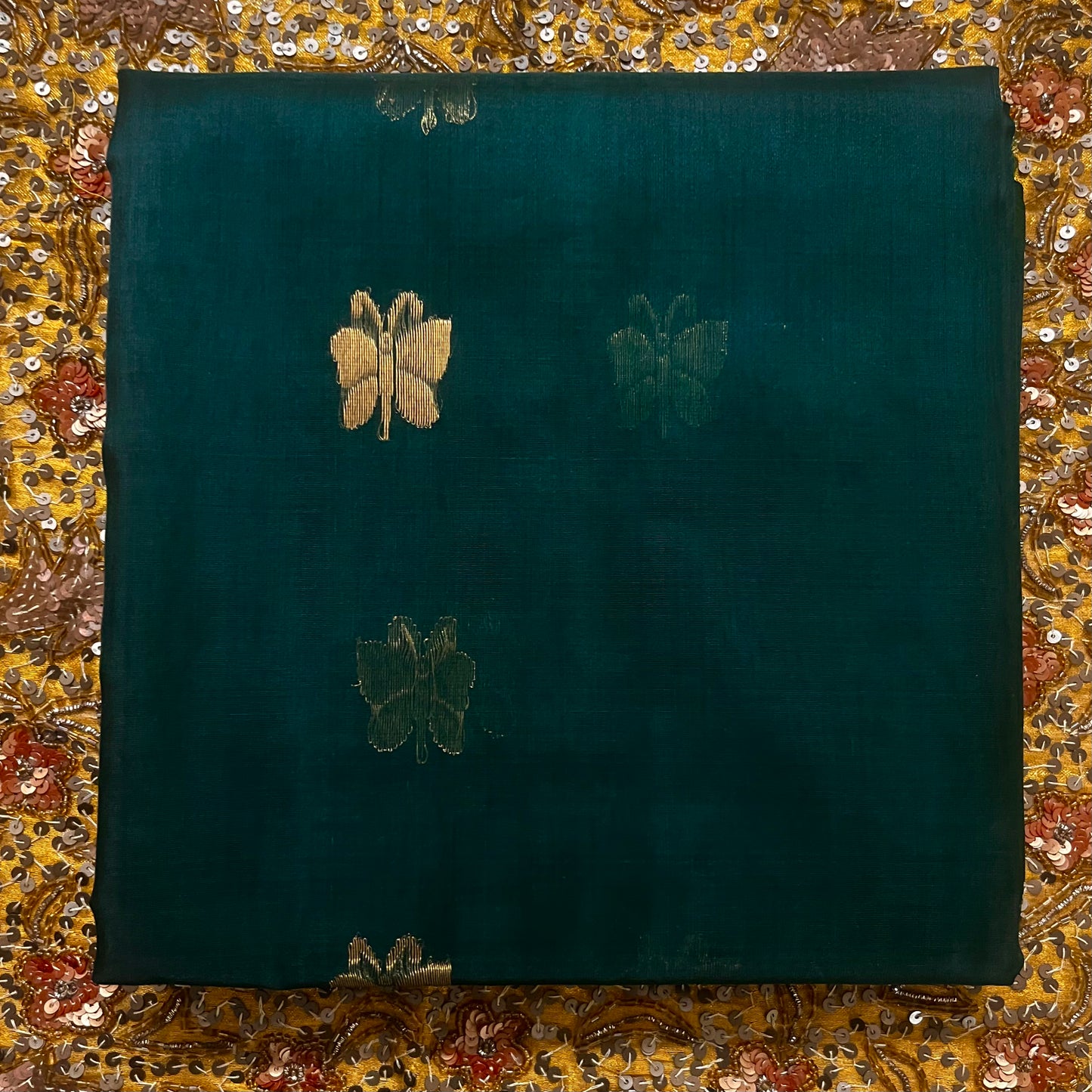 Teal green chanderi silk saree with butterfly motifs all over
