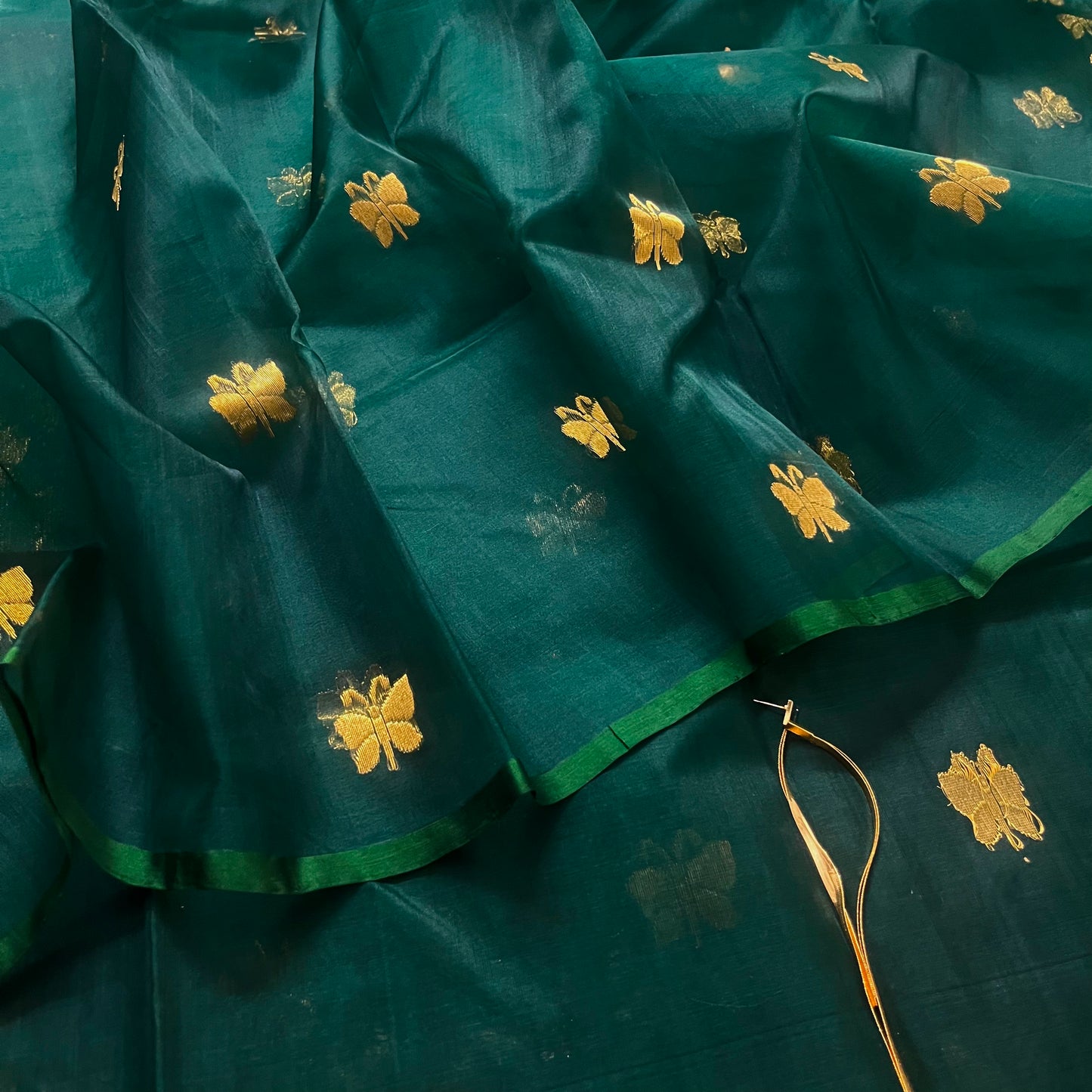 Teal green chanderi silk saree with butterfly motifs all over