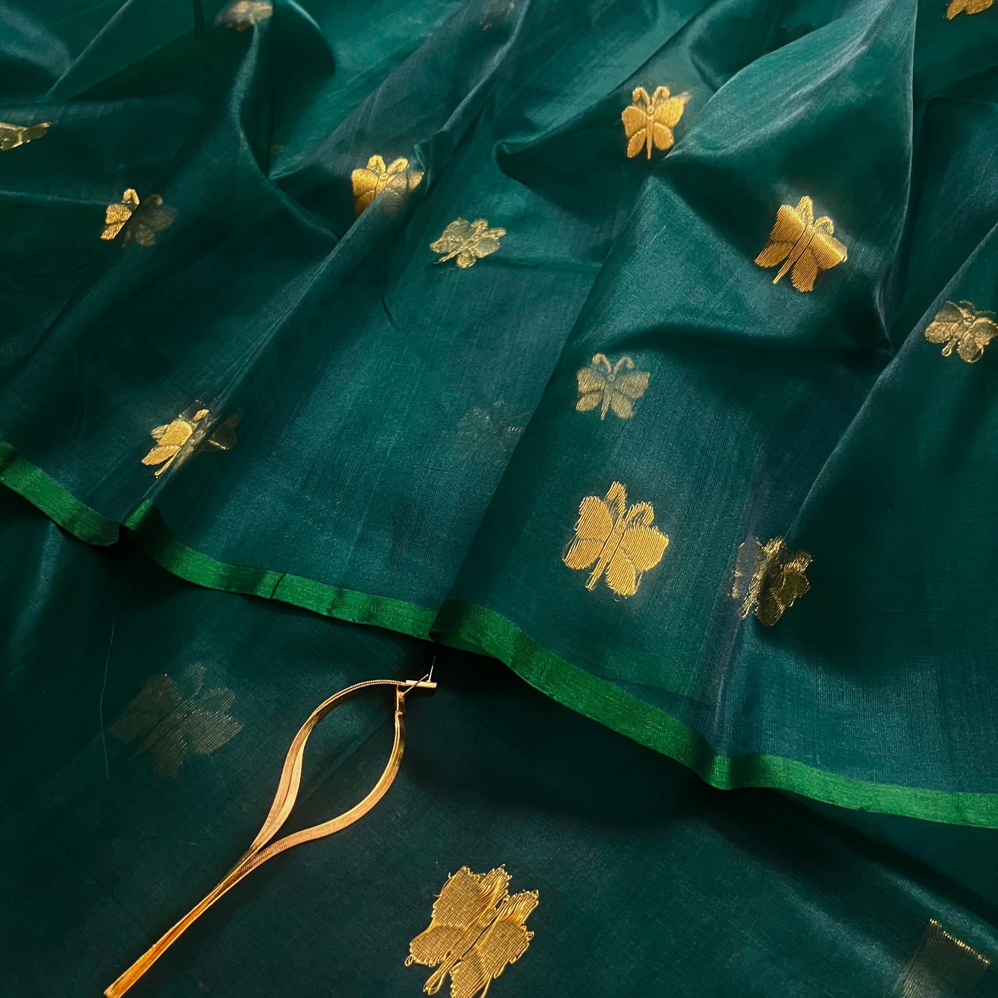 Teal green chanderi silk saree with butterfly motifs all over