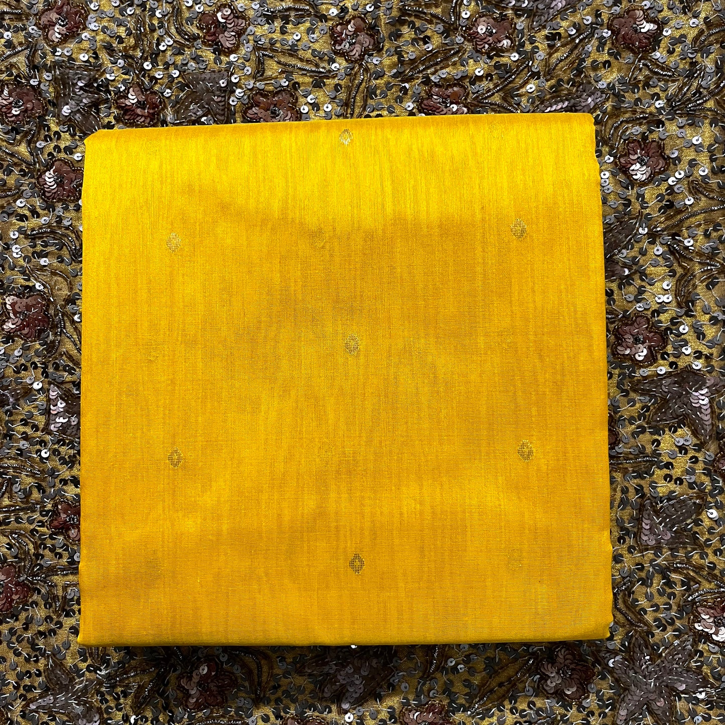 Yellow chanderi saree with zari bootis all over