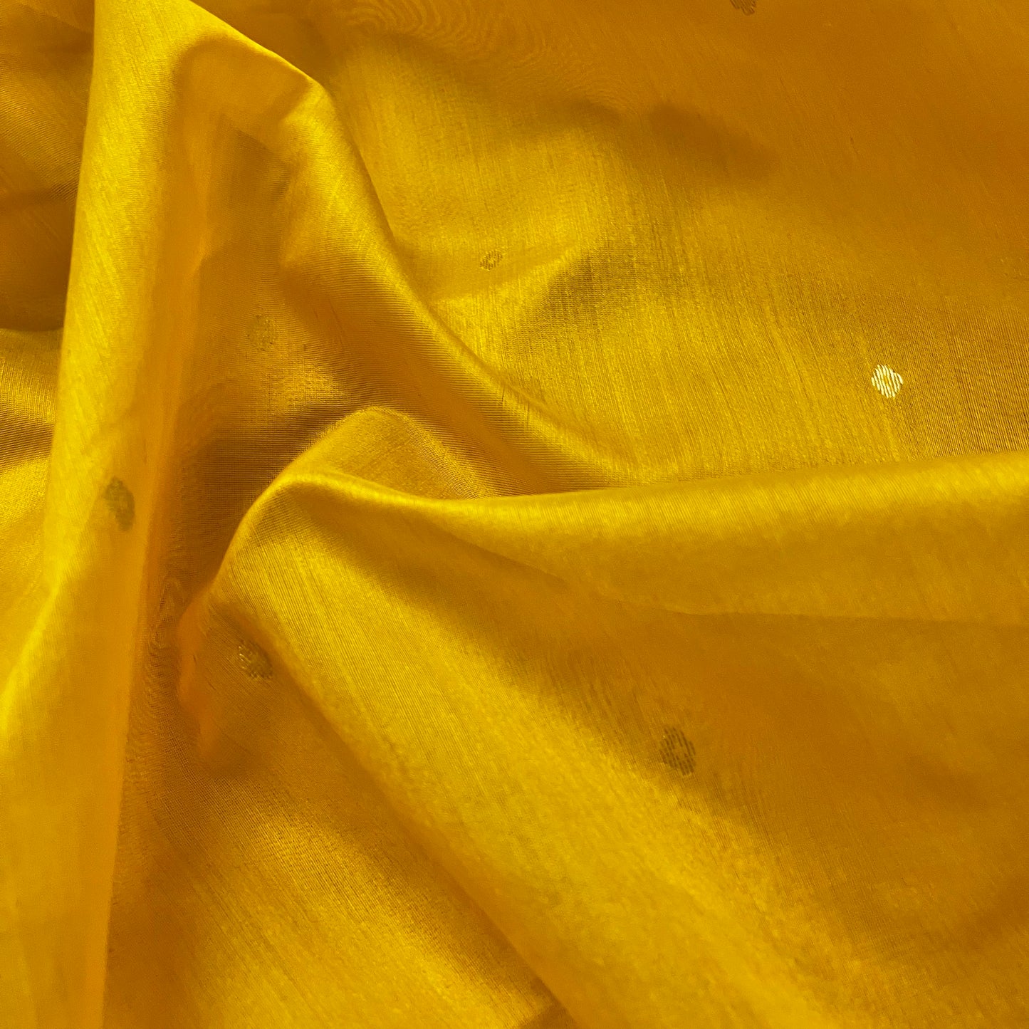 Yellow chanderi saree with zari bootis all over