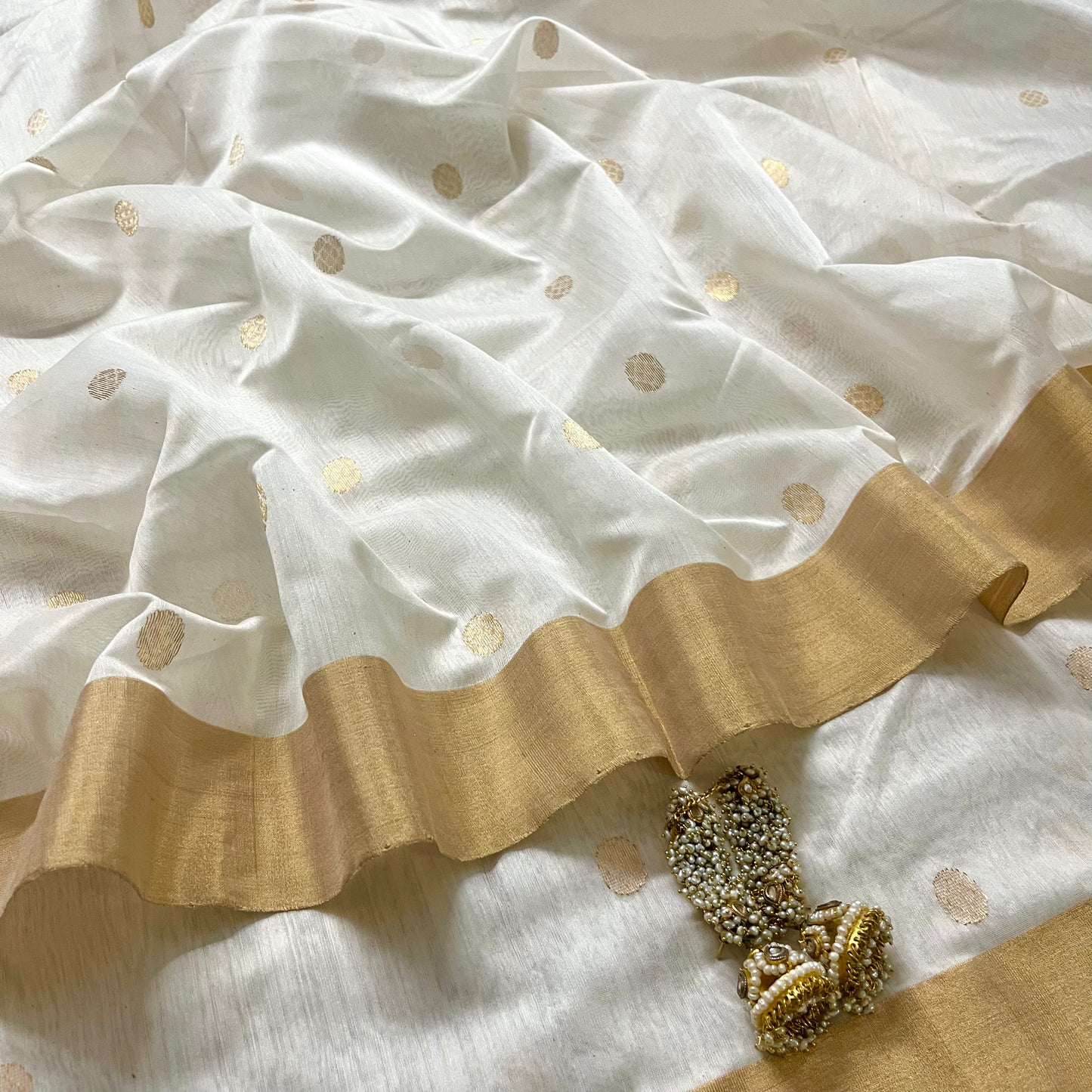 Off white chanderi saree with zari bootis all over