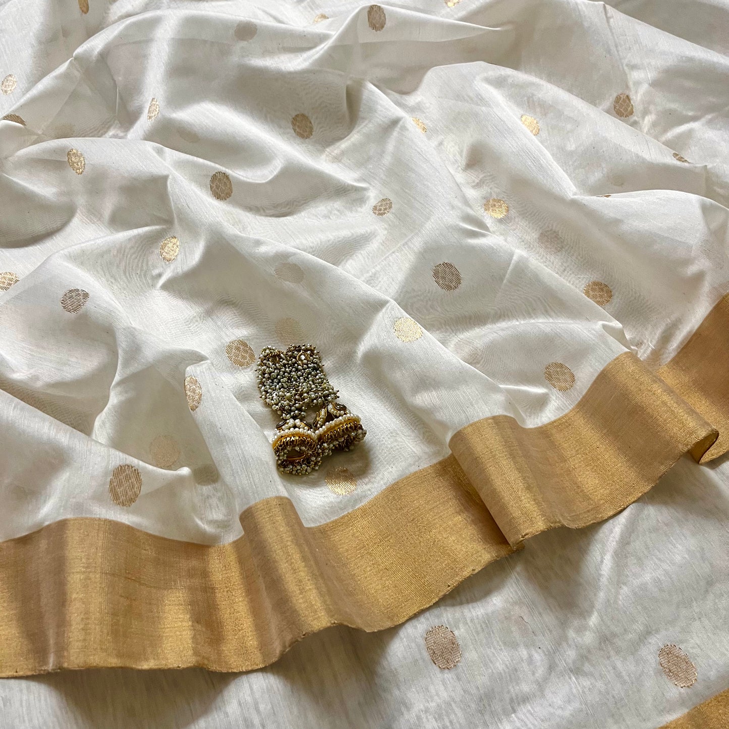 Off white chanderi saree with zari bootis all over