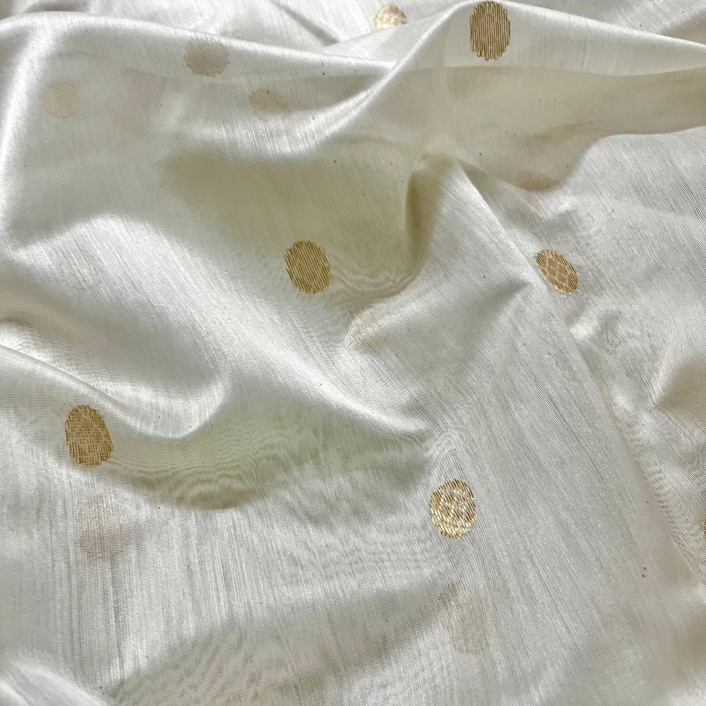 Off white chanderi saree with zari bootis all over