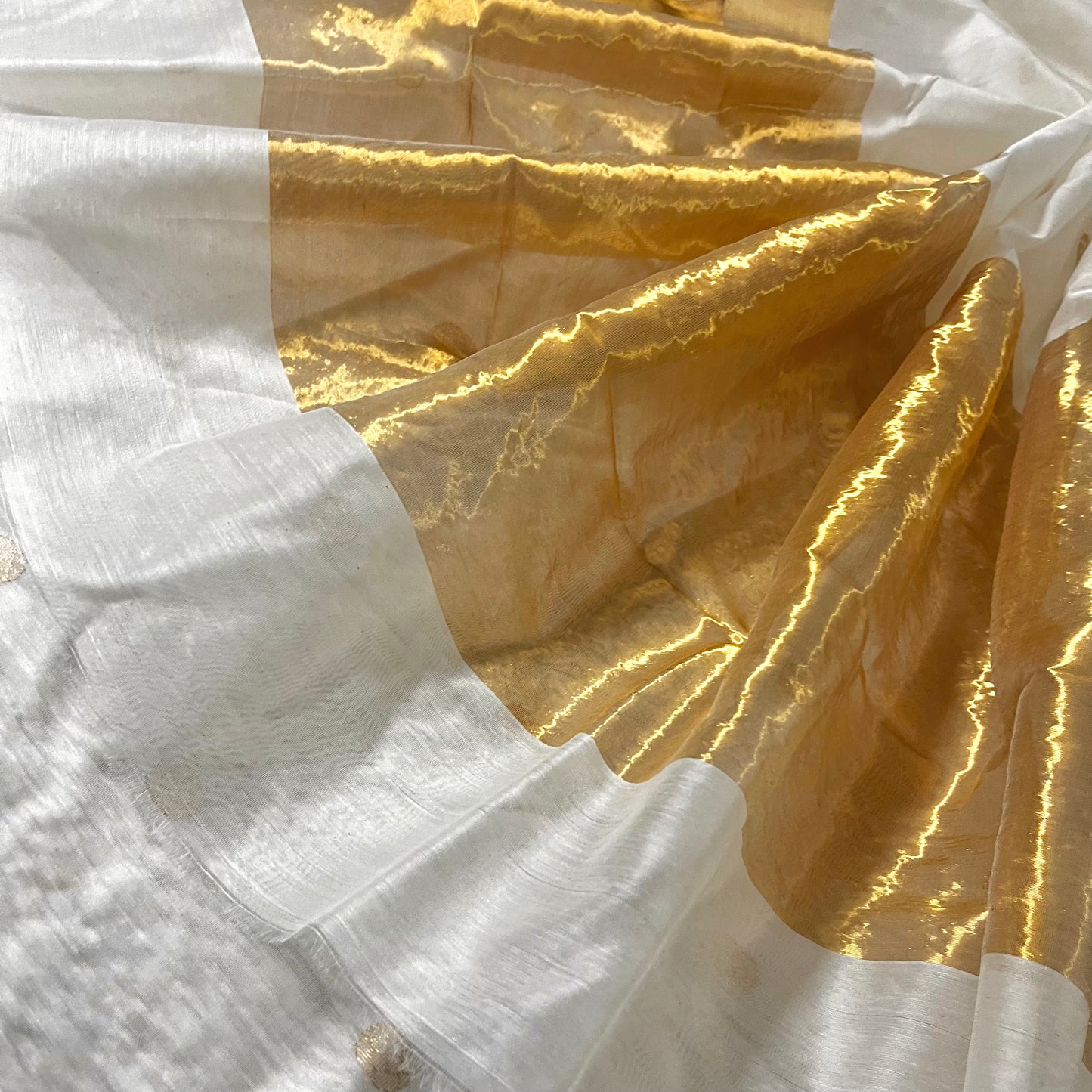 Off white chanderi saree with zari bootis all over