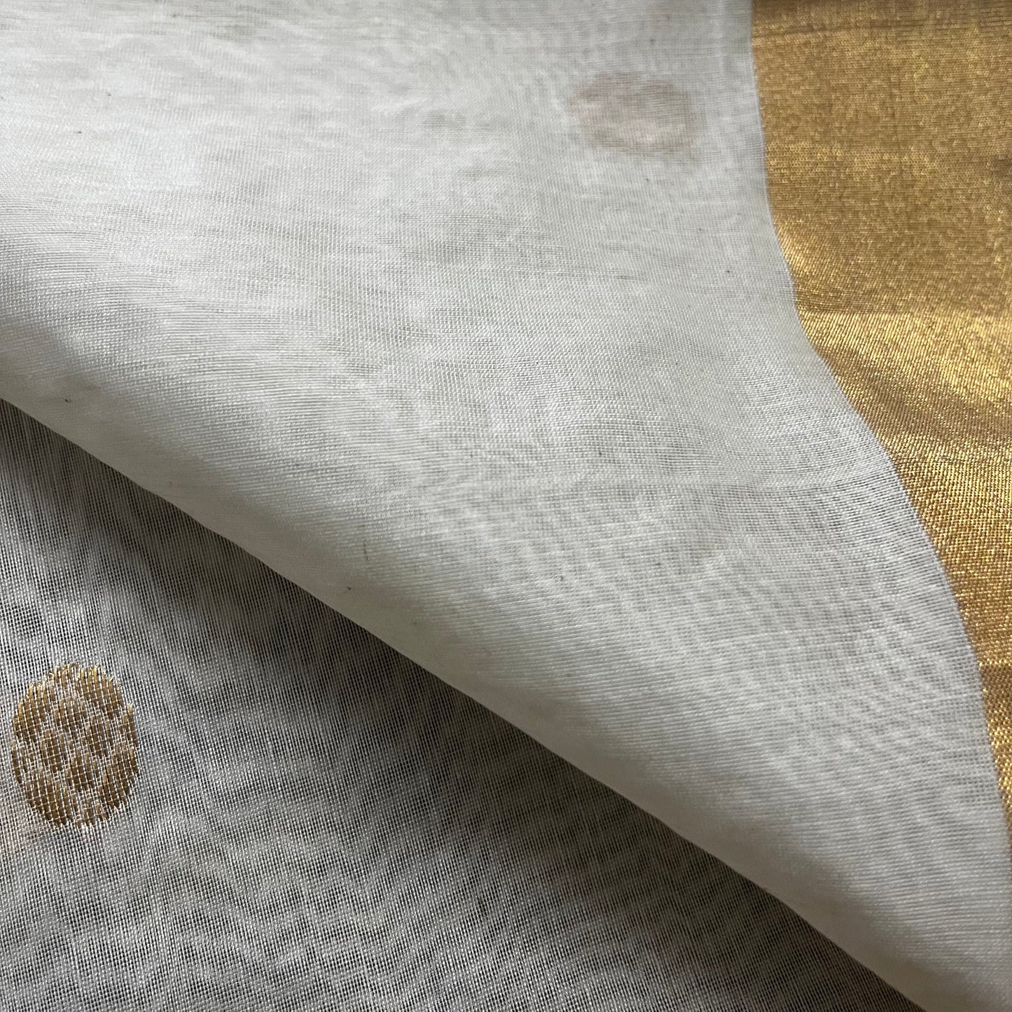 Off white chanderi saree with zari bootis all over