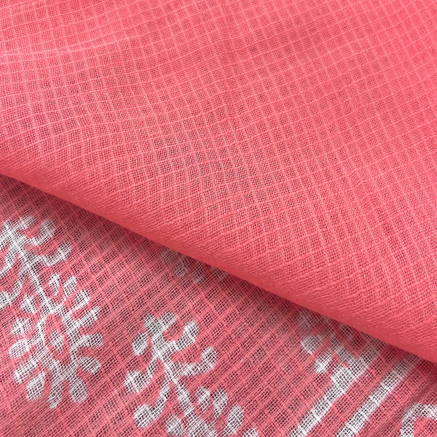 Peachish pink kota checks saree with block print all over