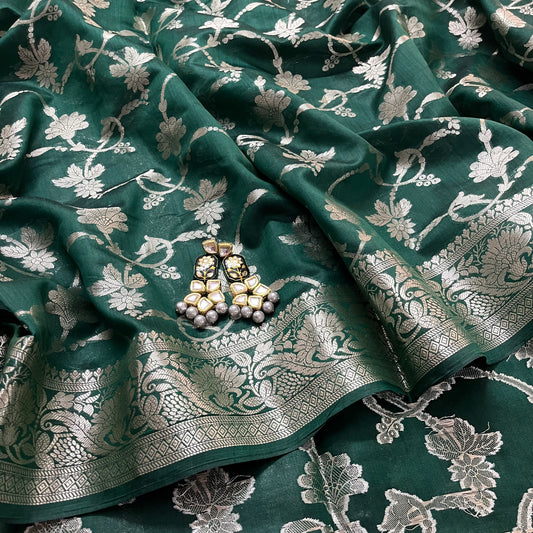 Dark green banarasi silk saree with zari pattern all over