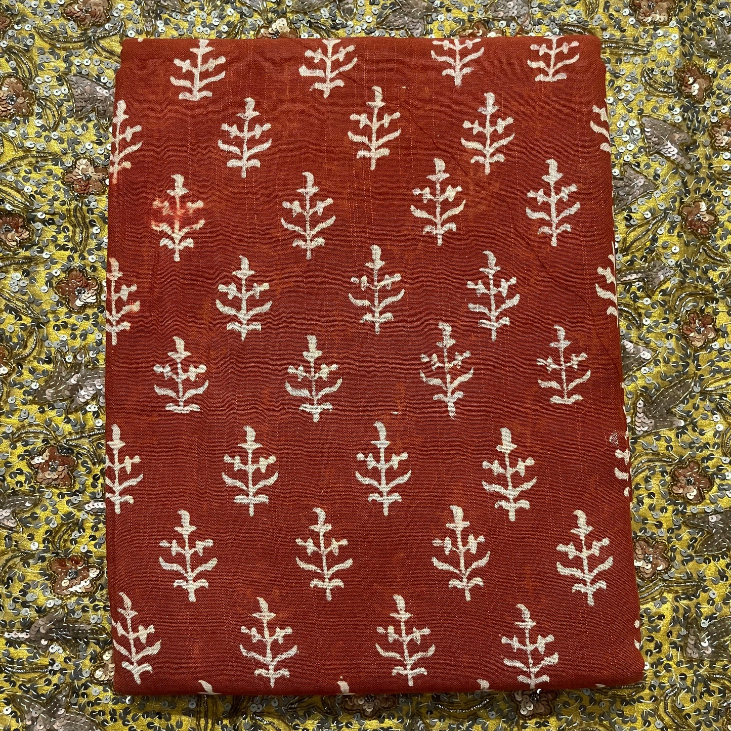 Rust linen saree with block print all over