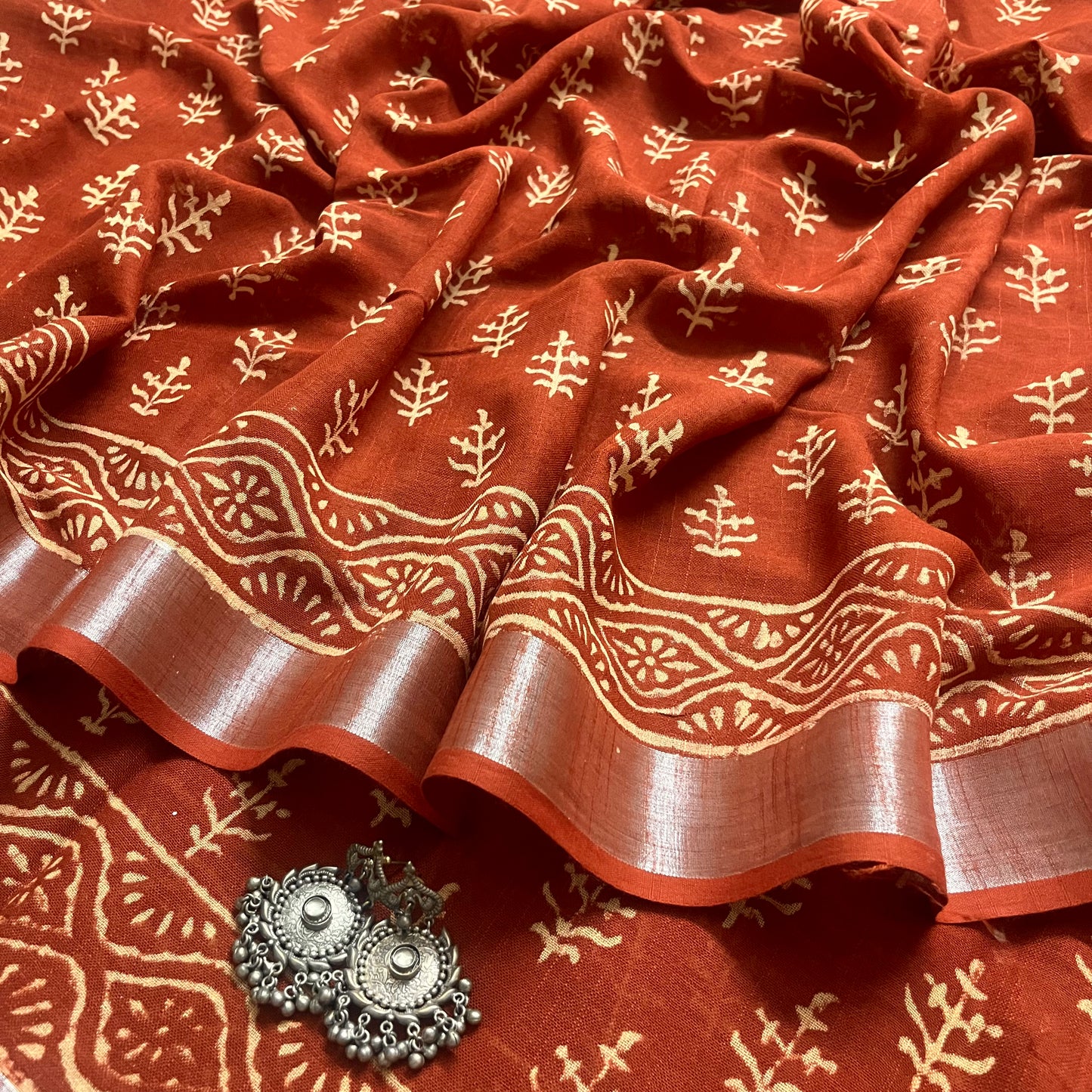 Rust linen saree with block print all over