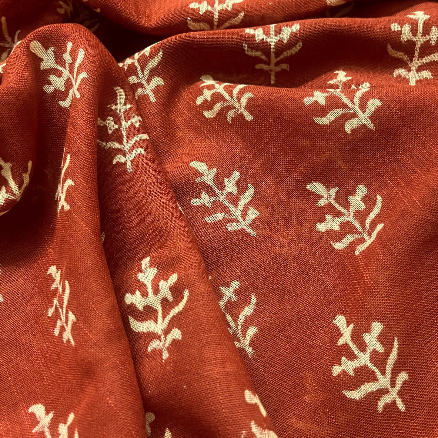 Rust linen saree with block print all over