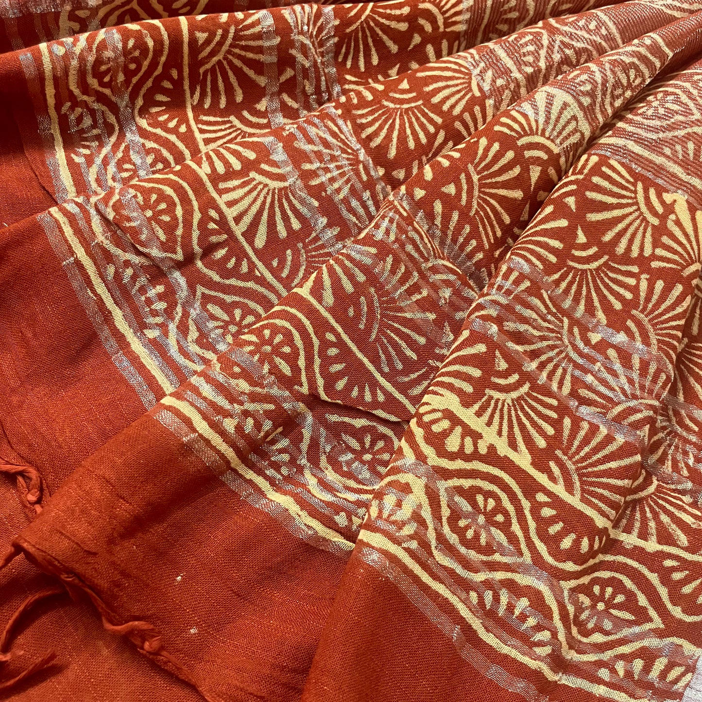 Rust linen saree with block print all over