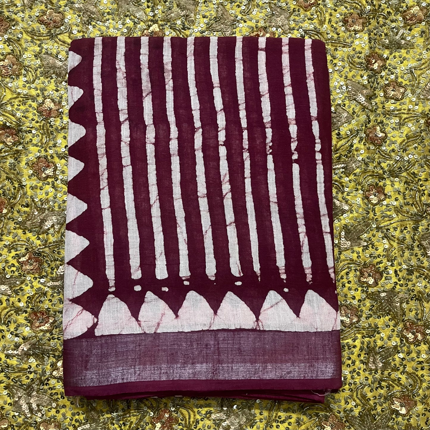 Dark maroon linen saree with block print all over