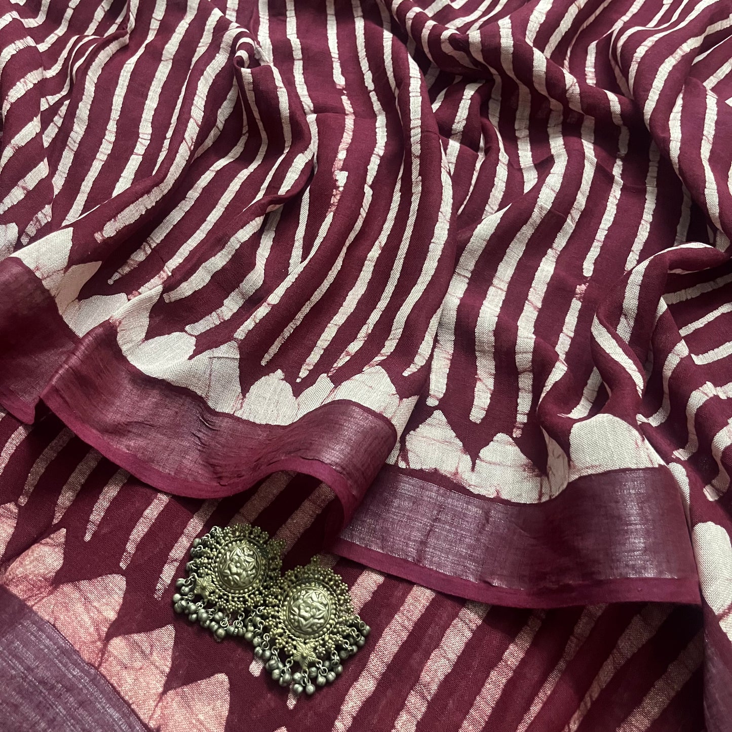Dark maroon linen saree with block print all over