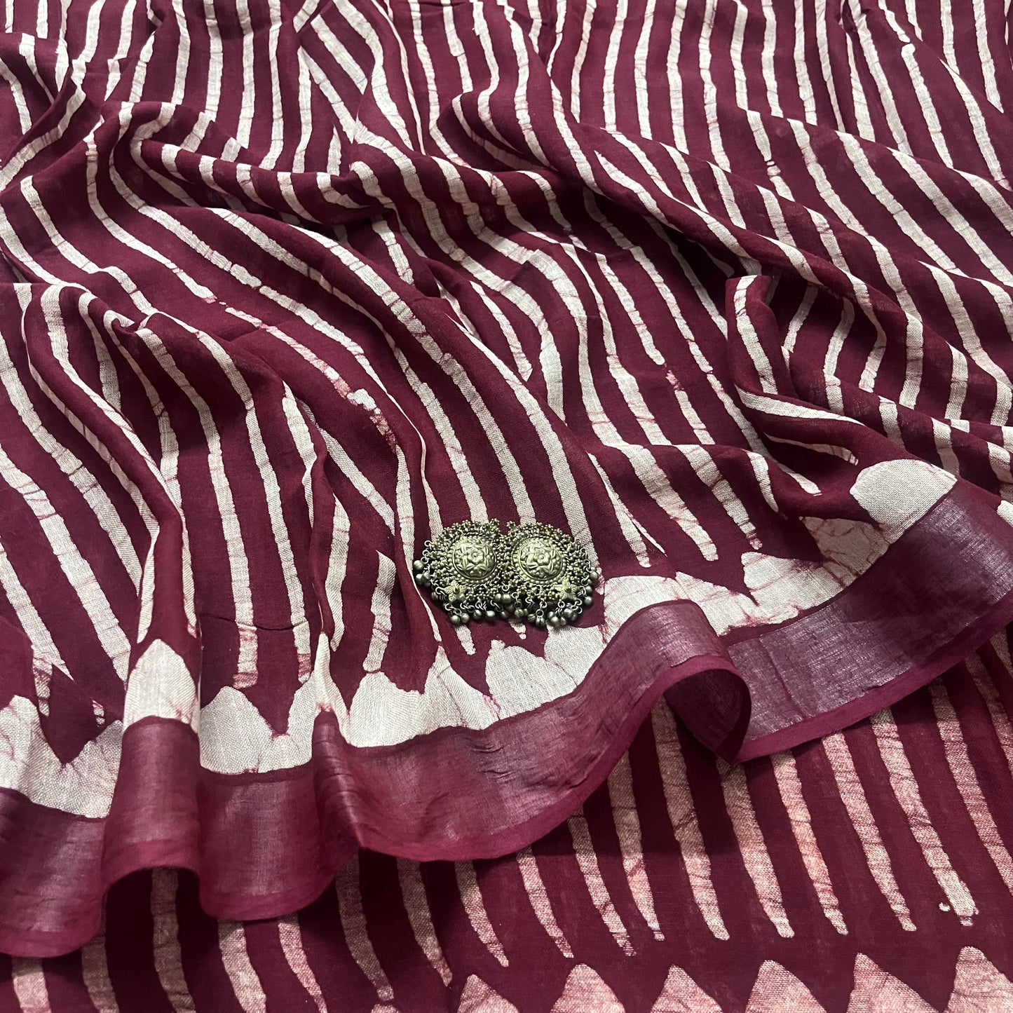 Dark maroon linen saree with block print all over