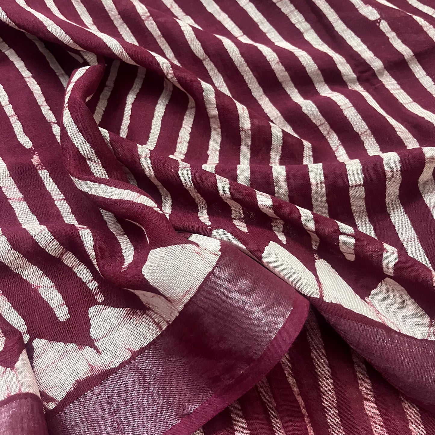 Dark maroon linen saree with block print all over