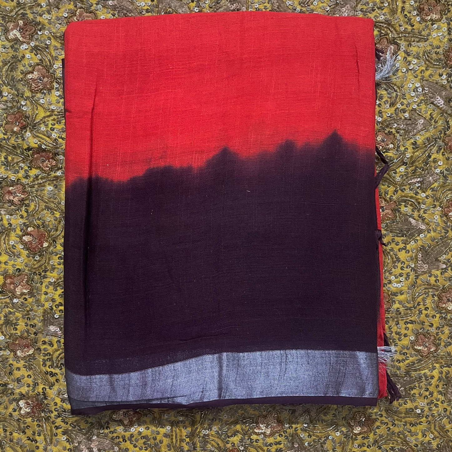 Rust and maroon linen saree with block print all over