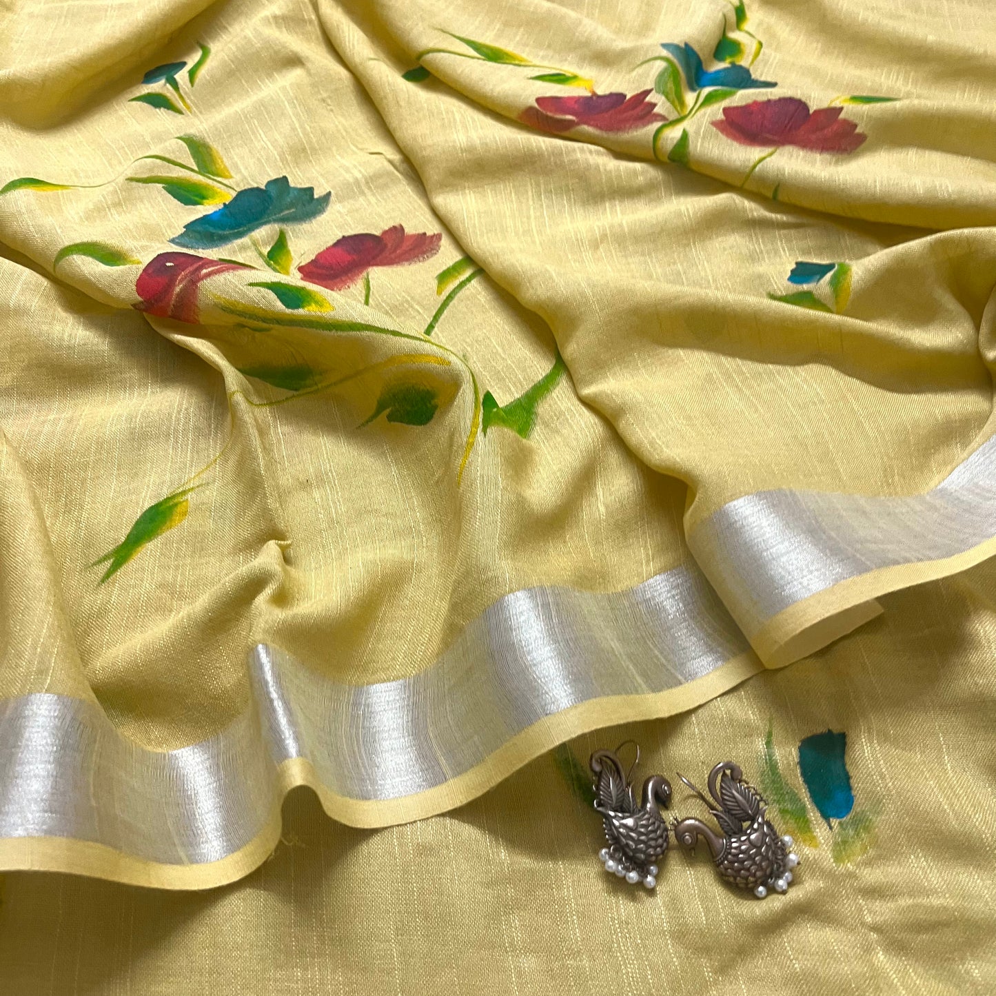 Corn yellow linen saree with hand painten flowers all over