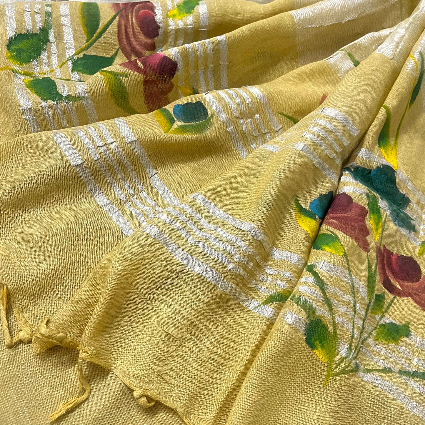 Corn yellow linen saree with hand painten flowers all over