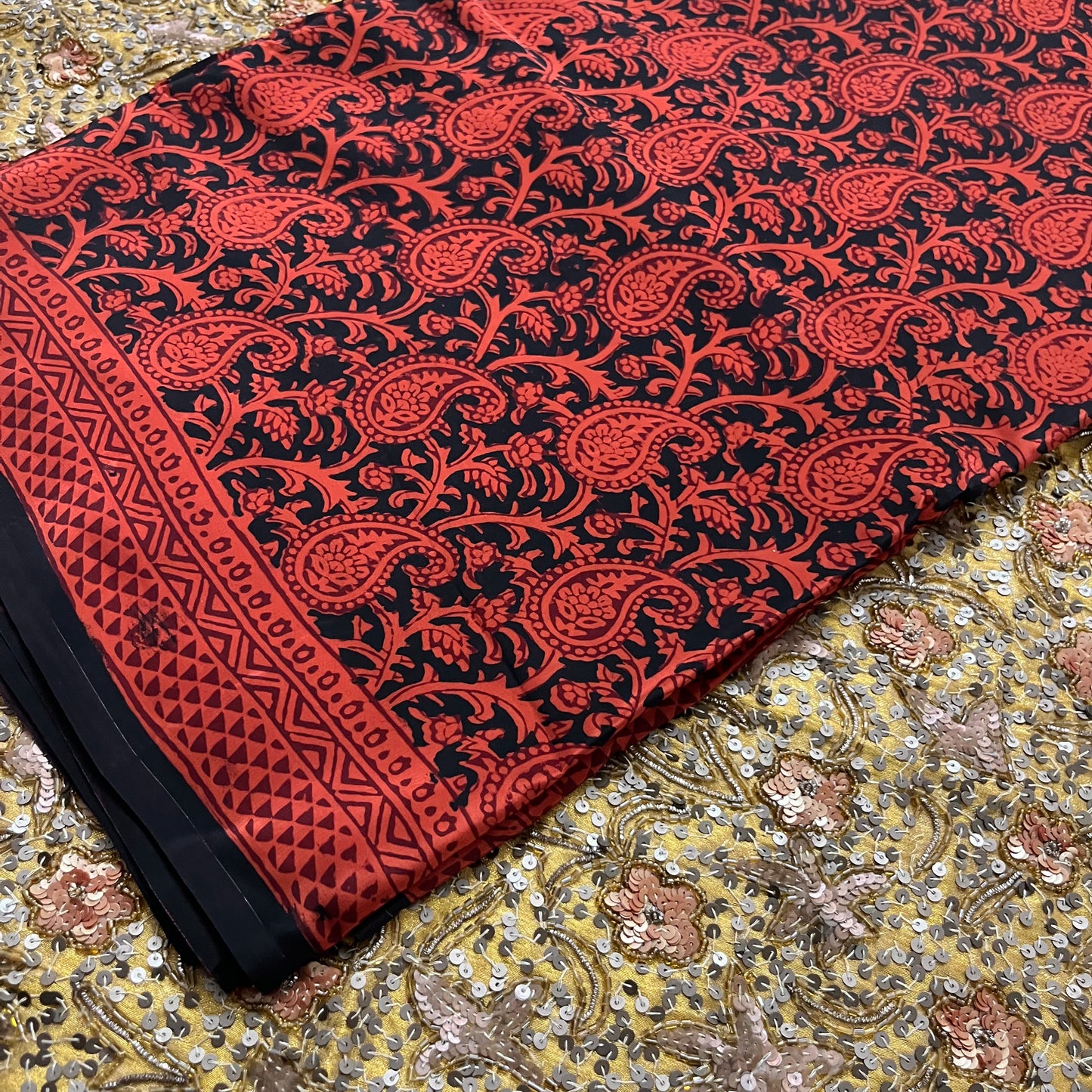 Rust and black bagh print saree