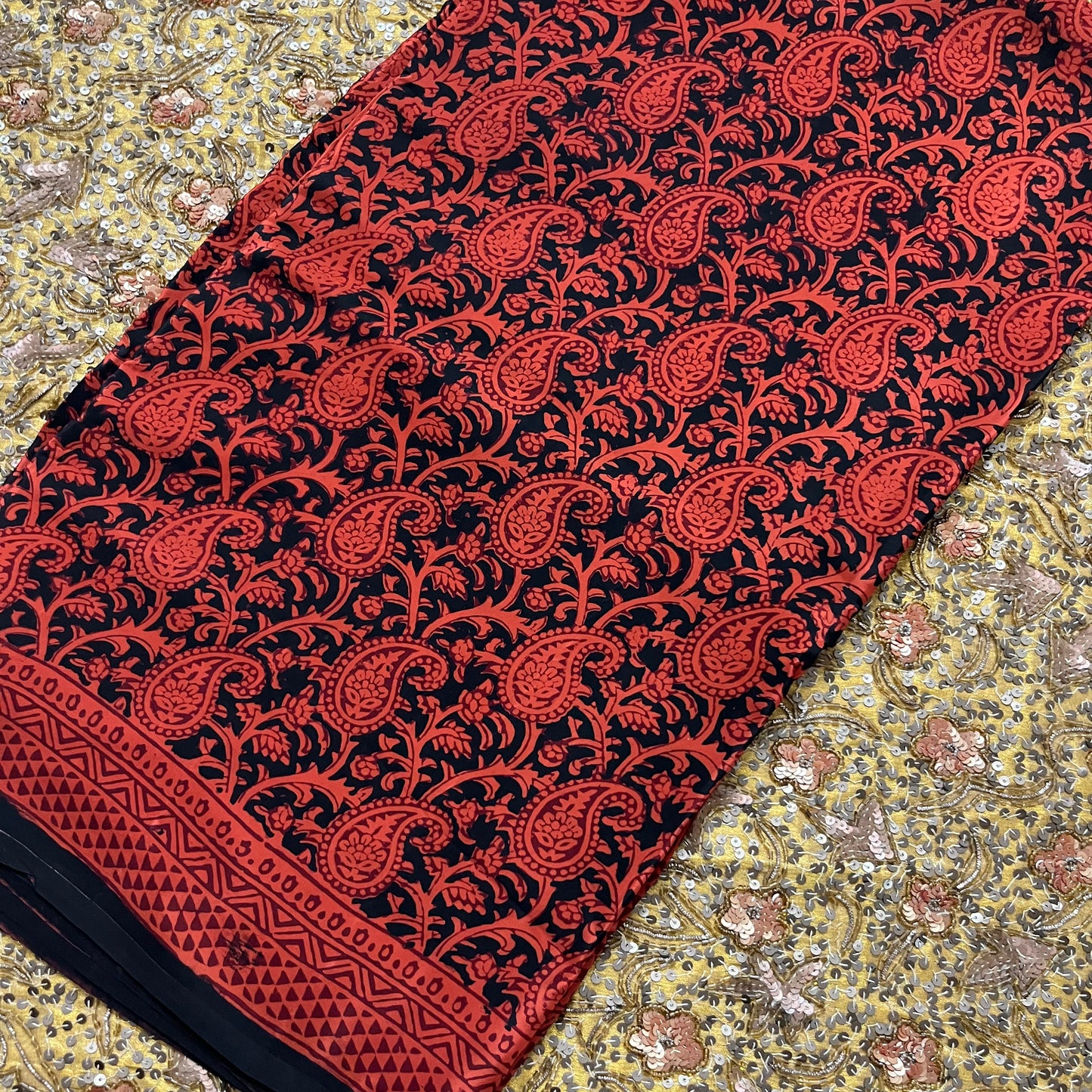 Rust and black bagh print saree