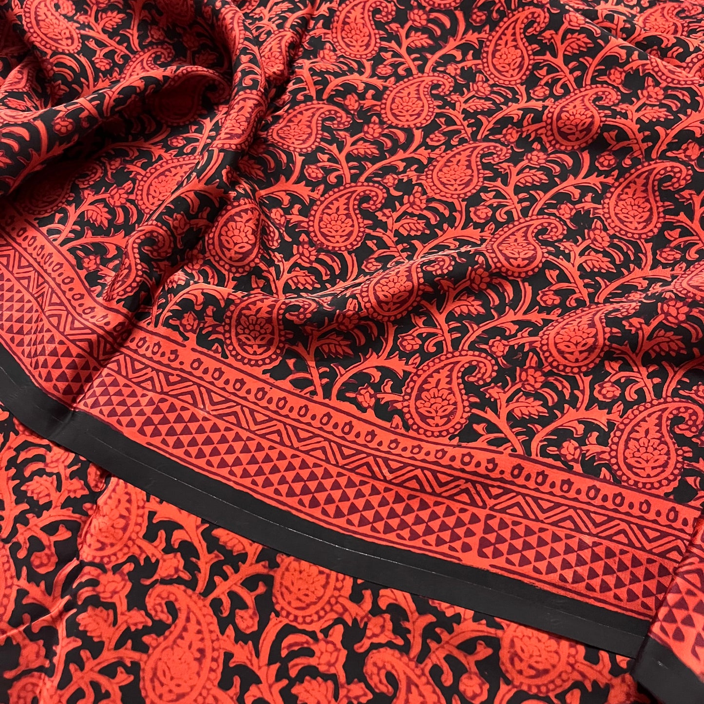 Rust and black bagh print saree