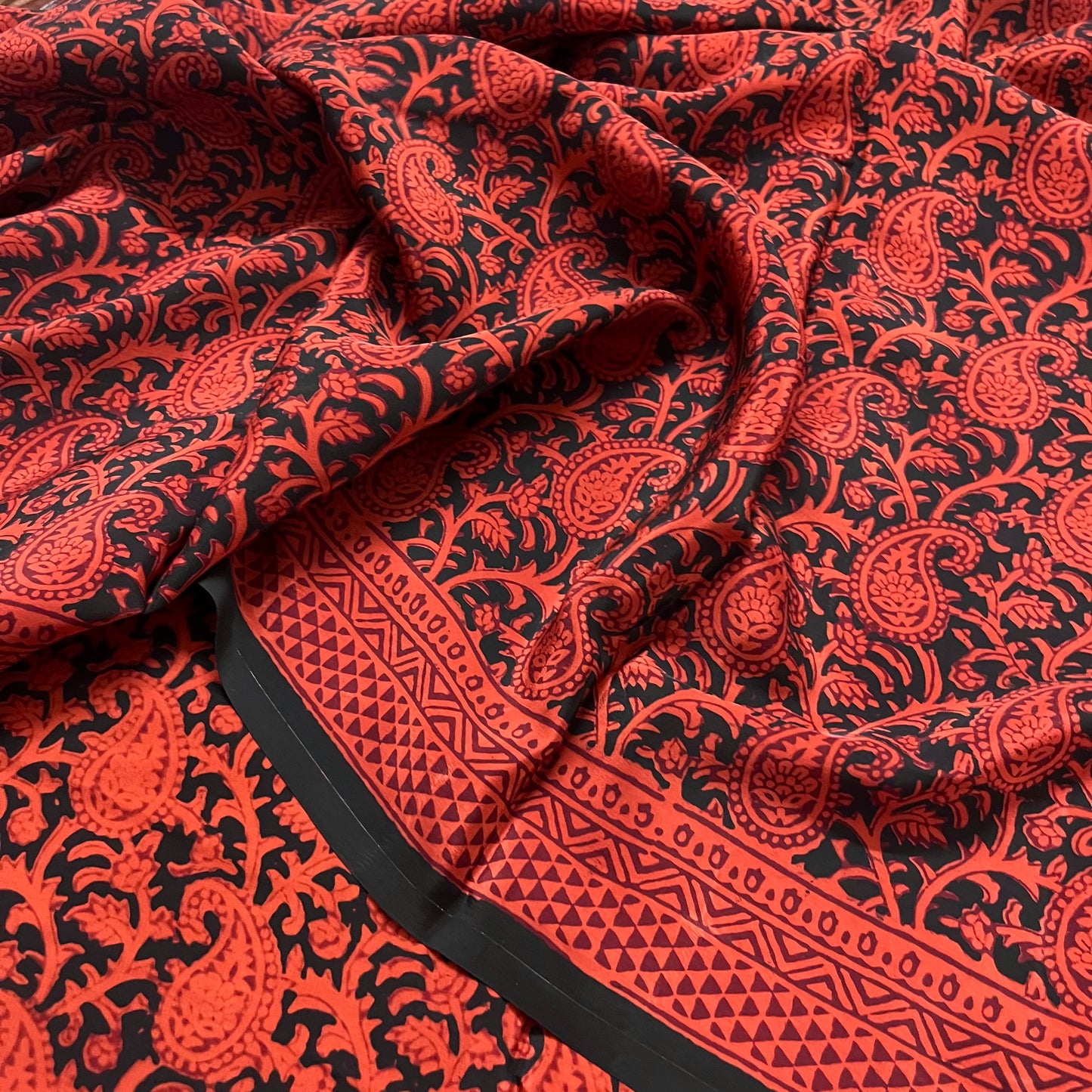 Rust and black bagh print saree