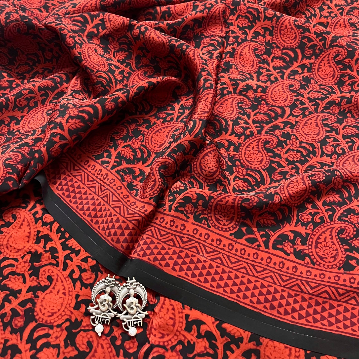 Rust and black bagh print saree