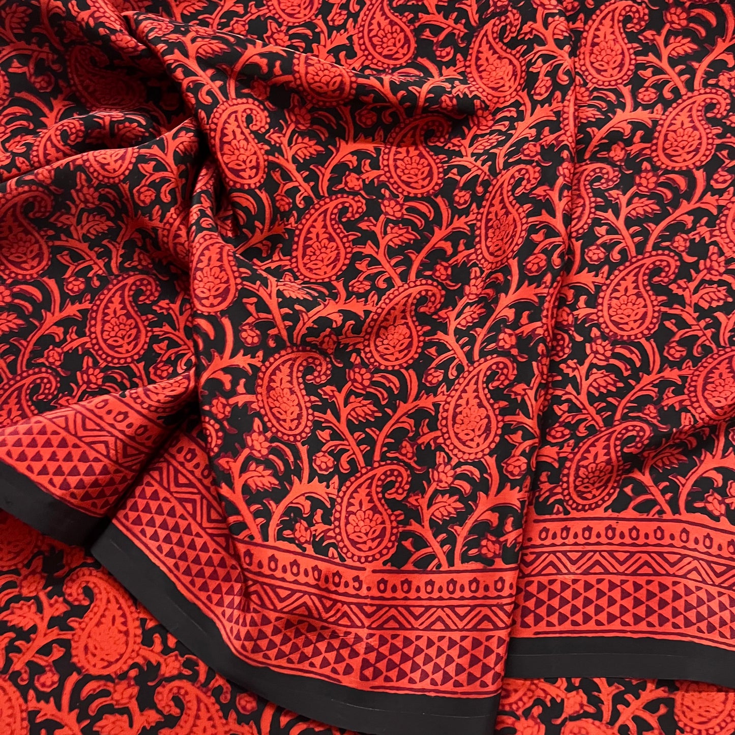 Rust and black bagh print saree