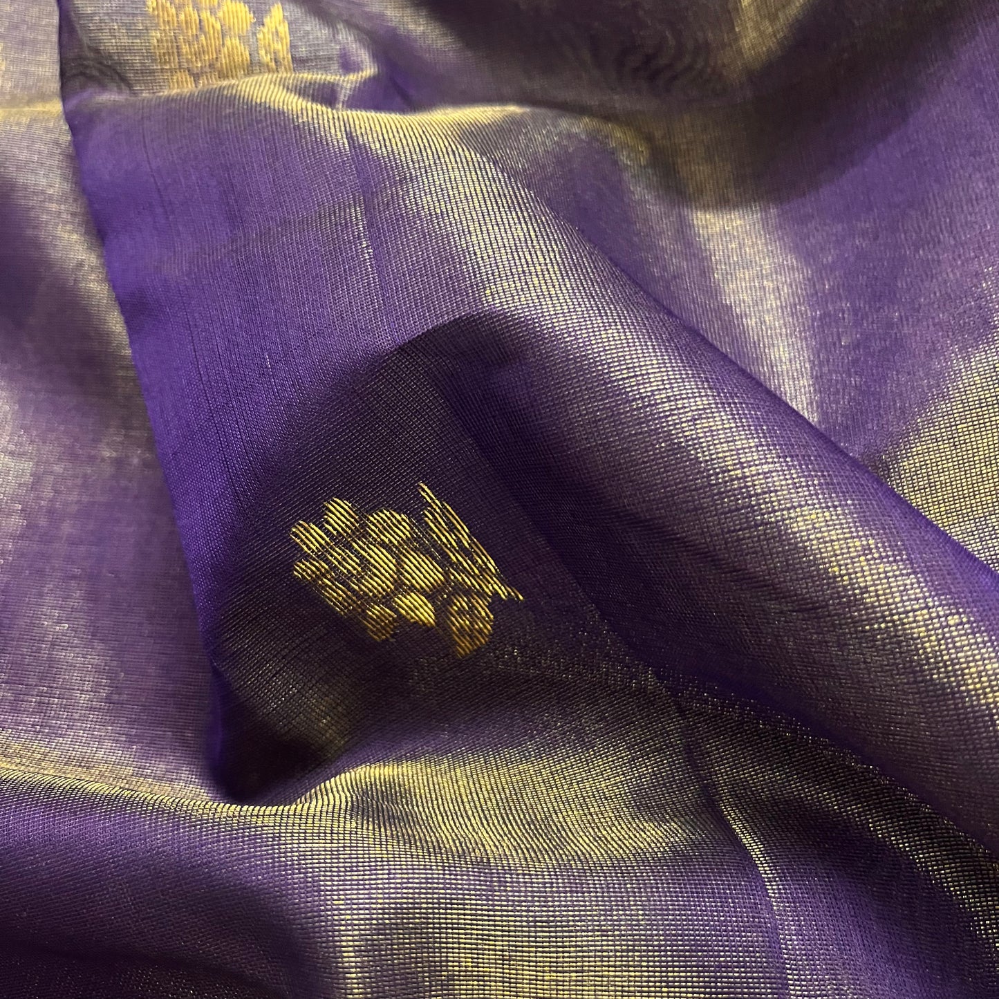 Dark purple maheshwari tissue silk saree with flower motifs all over