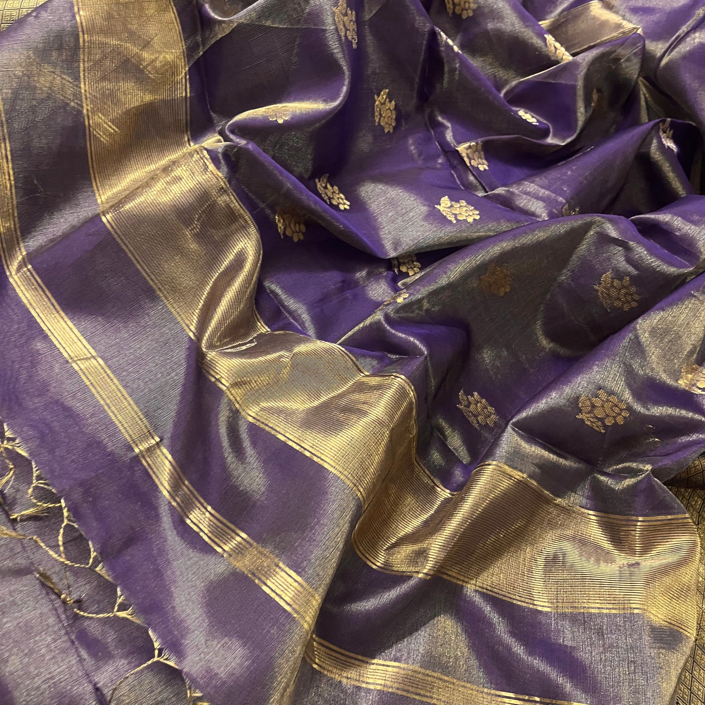Dark purple maheshwari tissue silk saree with flower motifs all over