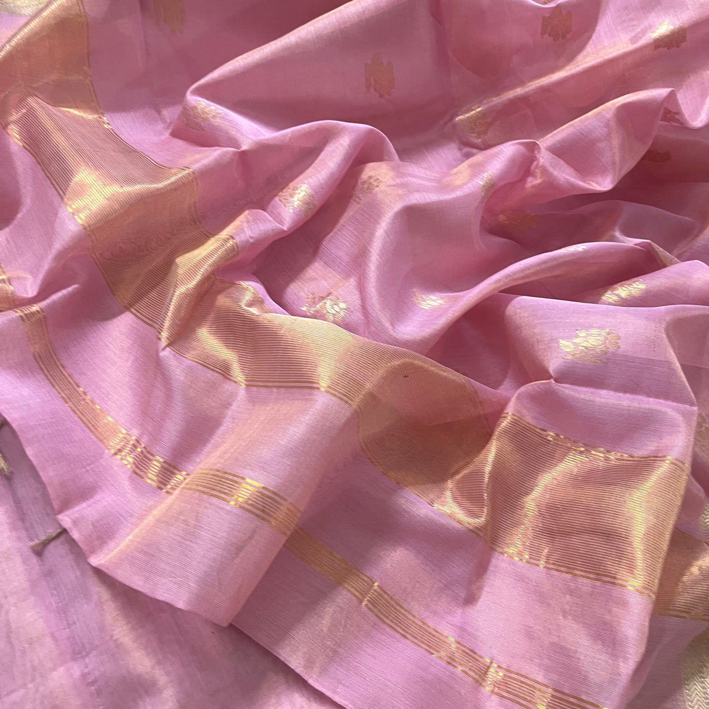 Pink maheshwari tissue silk saree with flower motifs all over