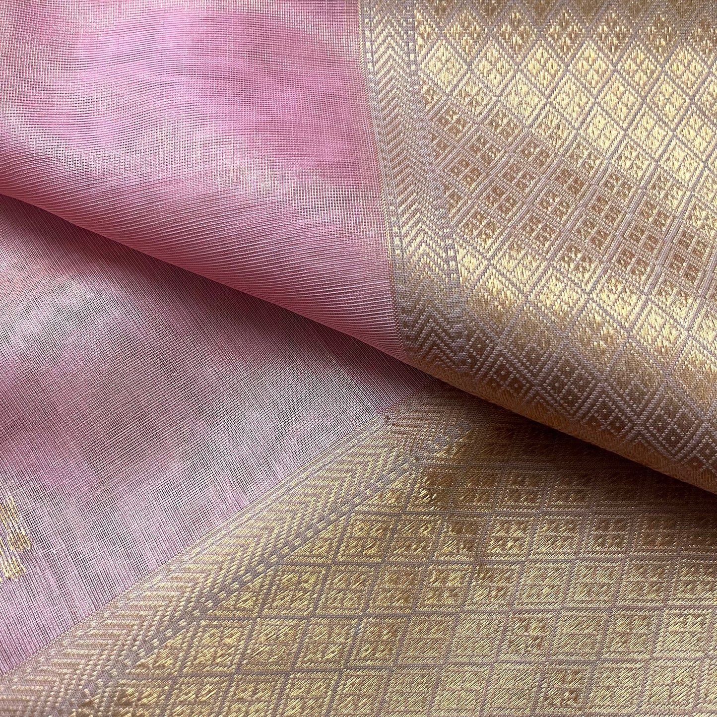Pink maheshwari tissue silk saree with flower motifs all over