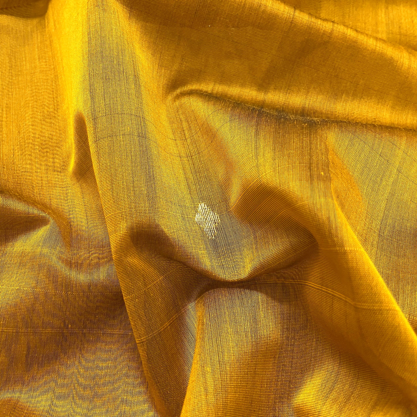 Gold mustard maheshwari saree with zari bootis all over
