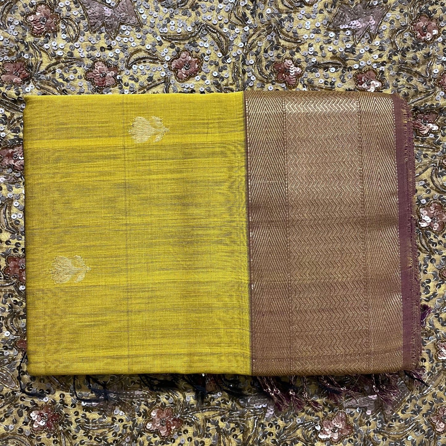 Mustard maheshwari saree with flower motifs all over