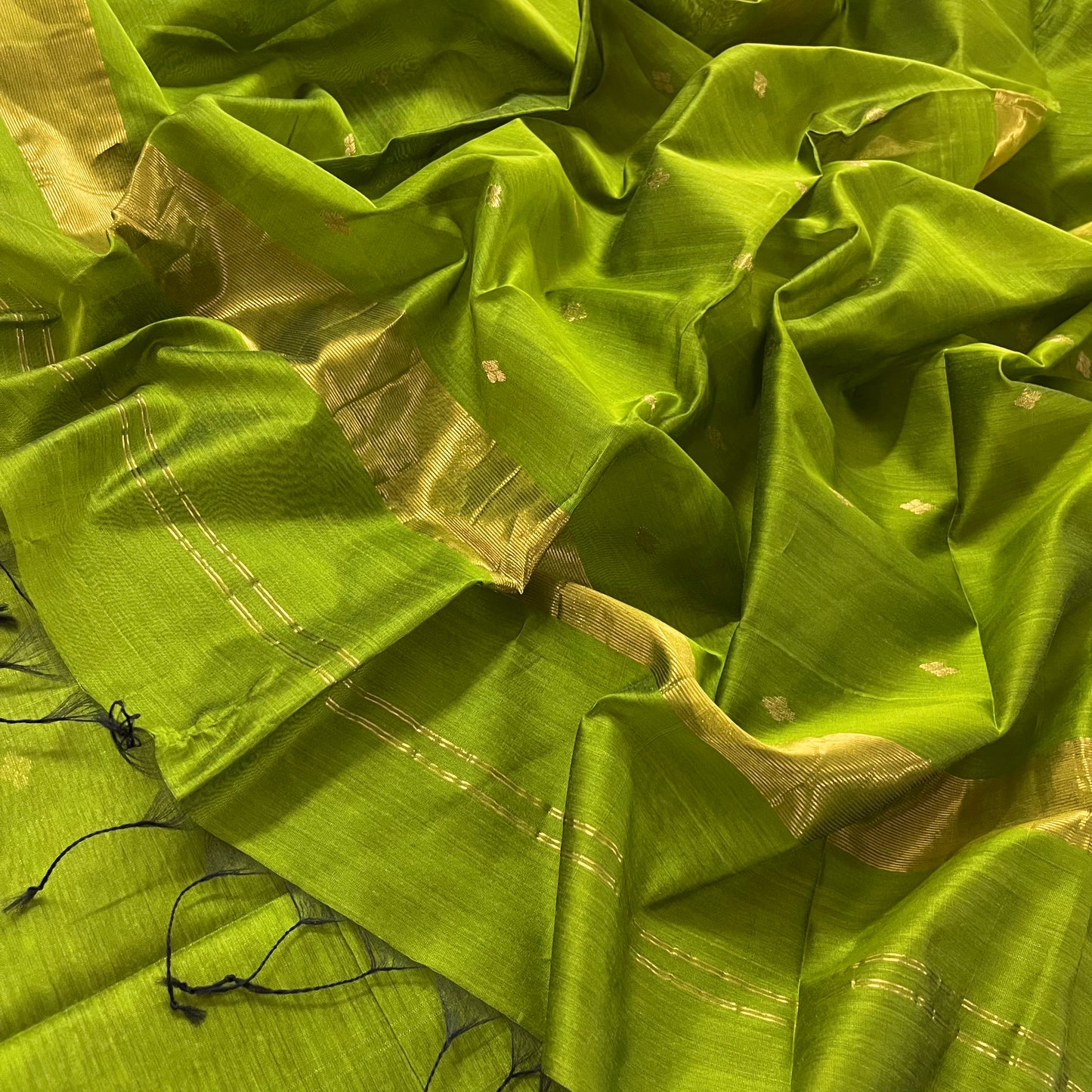 Olive green maheshwari saree with zari bootis all over