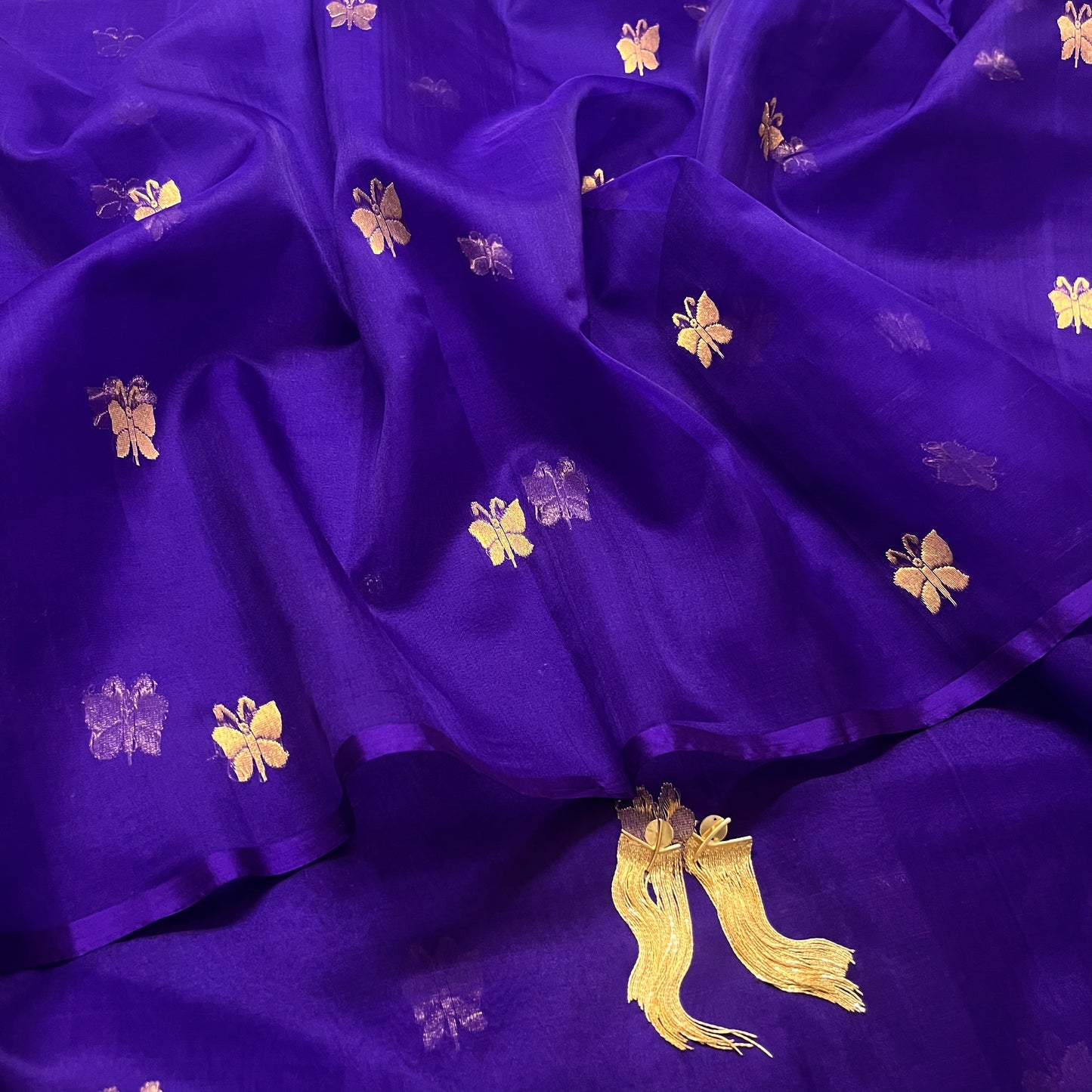 Dark purple chanderi organza silk saree with butterfly motifs all over