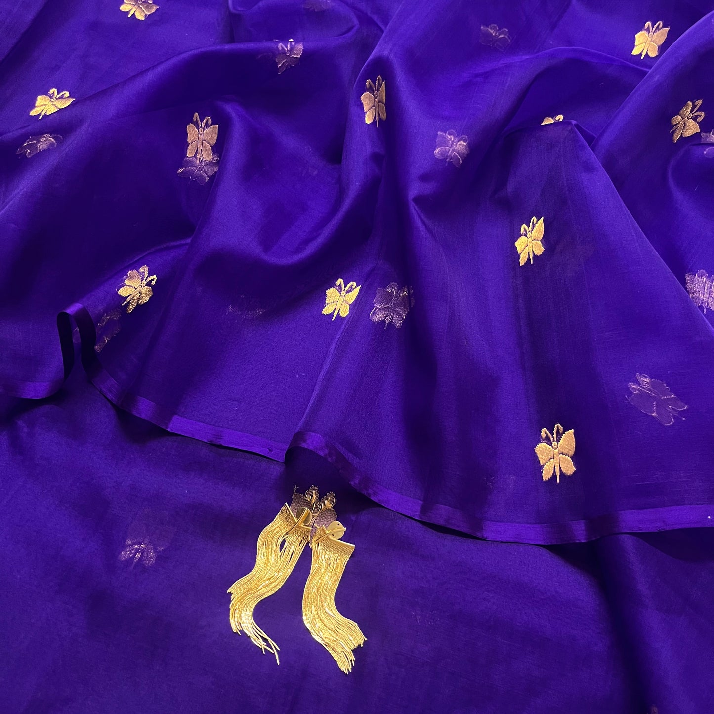 Dark purple chanderi organza silk saree with butterfly motifs all over