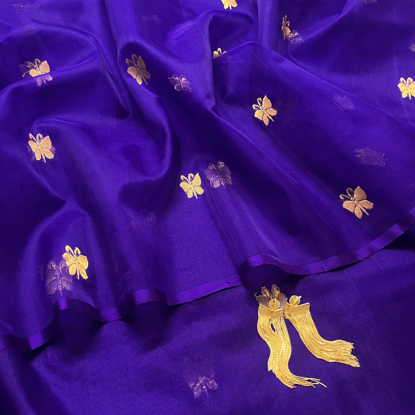 Dark purple chanderi organza silk saree with butterfly motifs all over