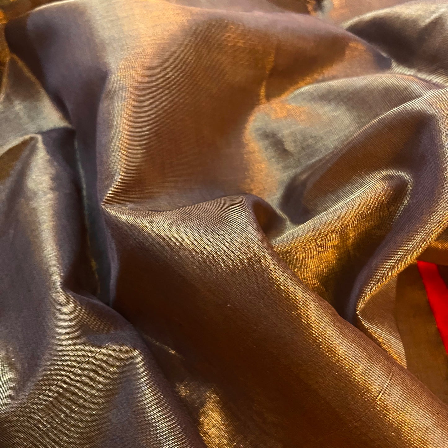 Bronze gold & red maheshwari tissue silk saree with zari lines on pallu