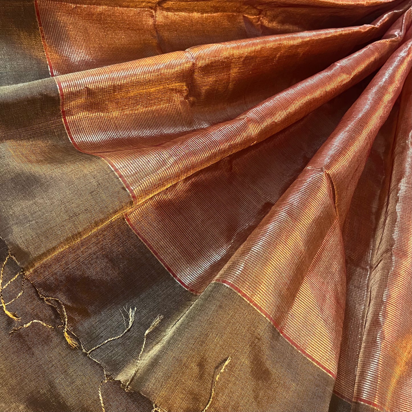 Bronze gold & red maheshwari tissue silk saree with zari lines on pallu