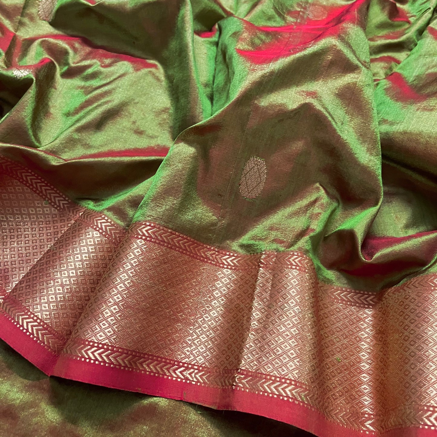 Olive green and red Maheshwari silk saree with zari bootis all over