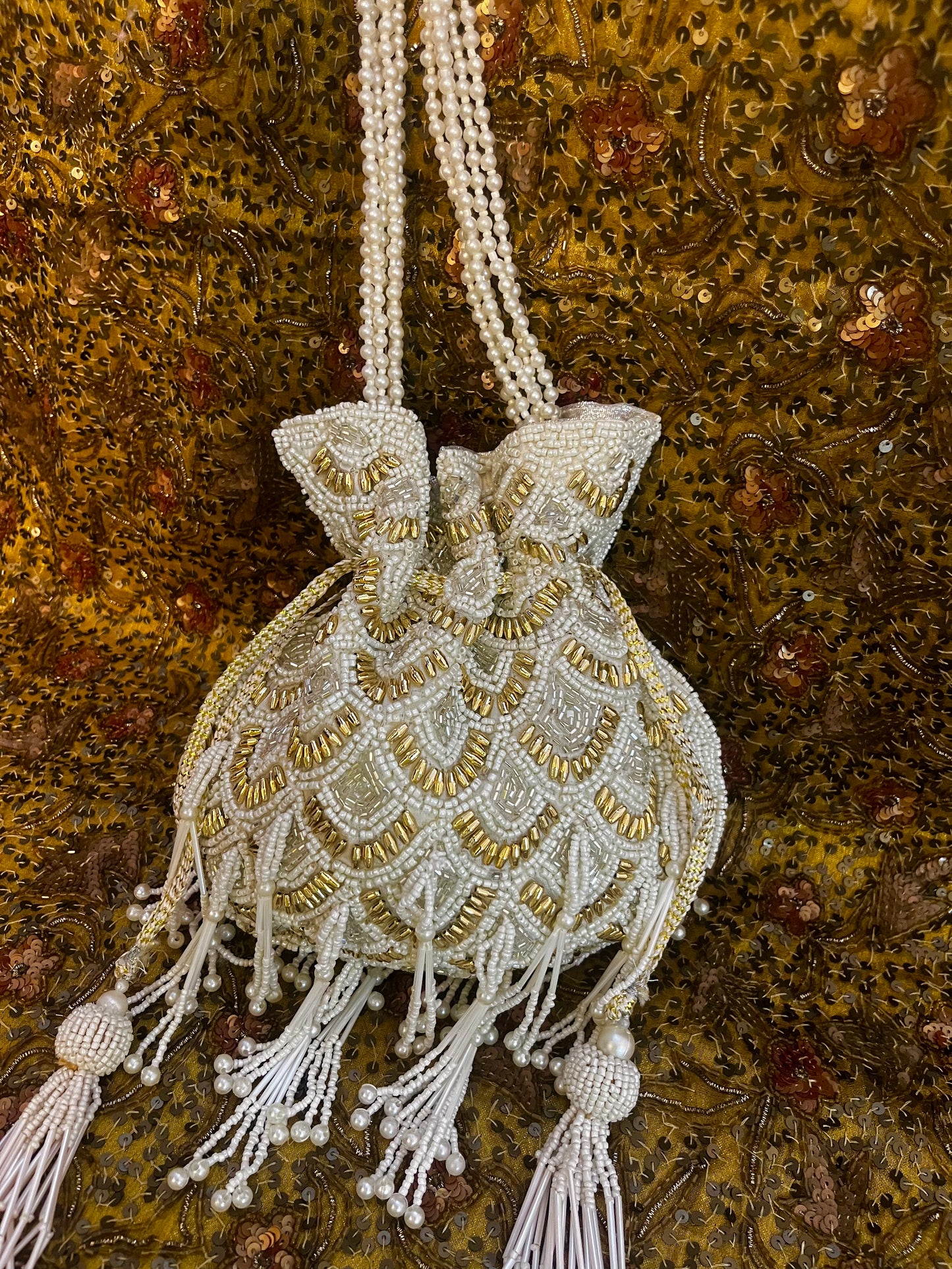 Pearly charm festive potli