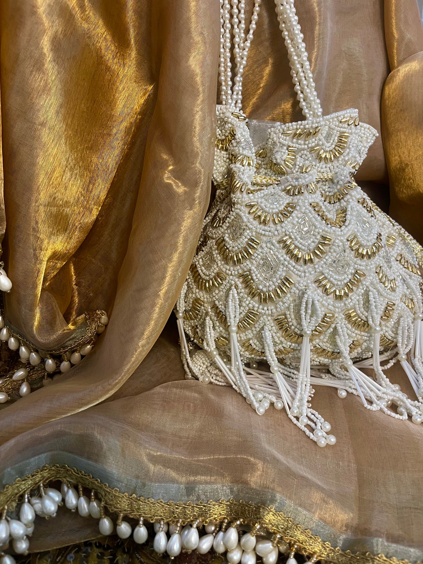 Pearly charm festive potli