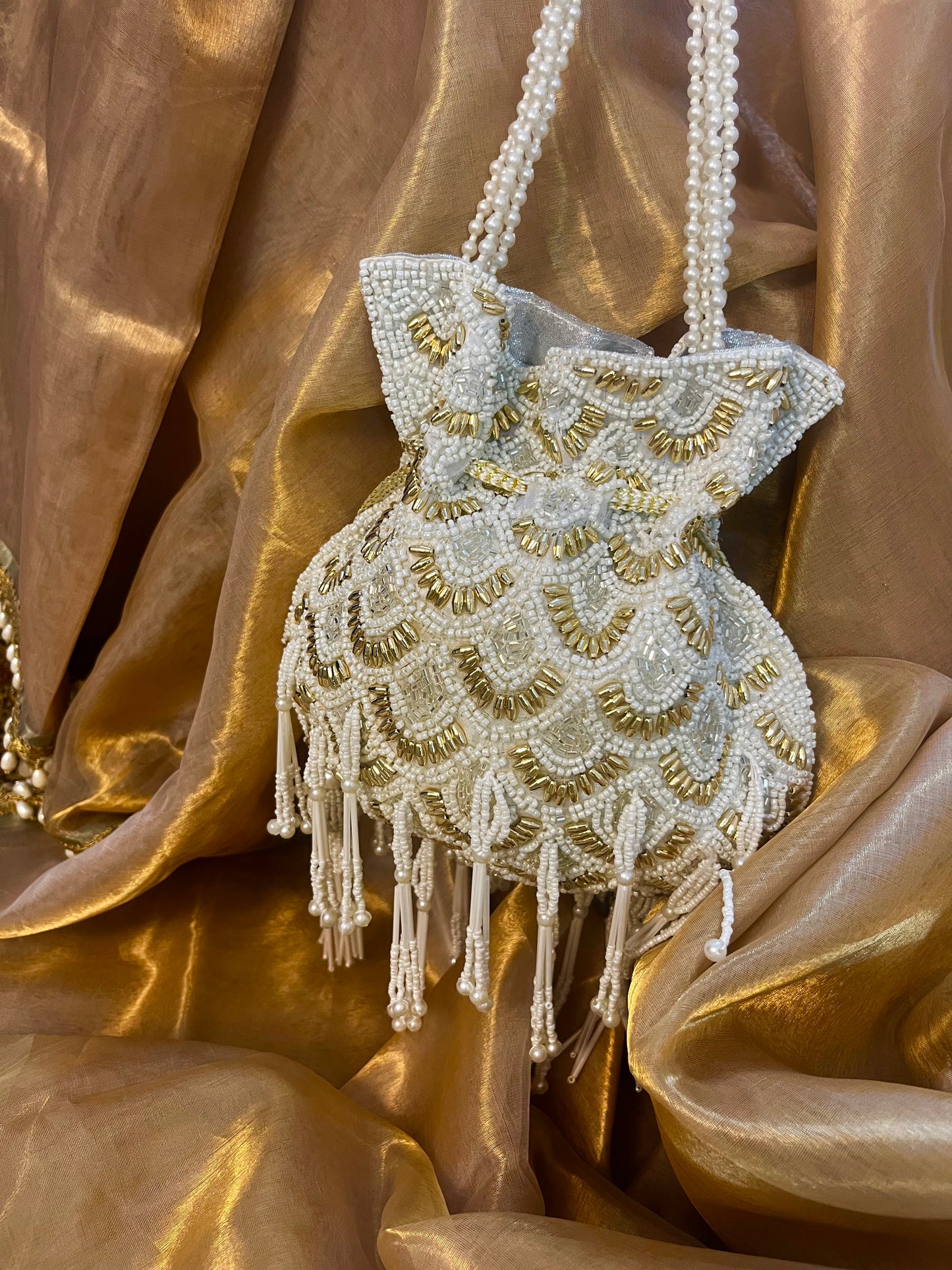Pearly charm festive potli