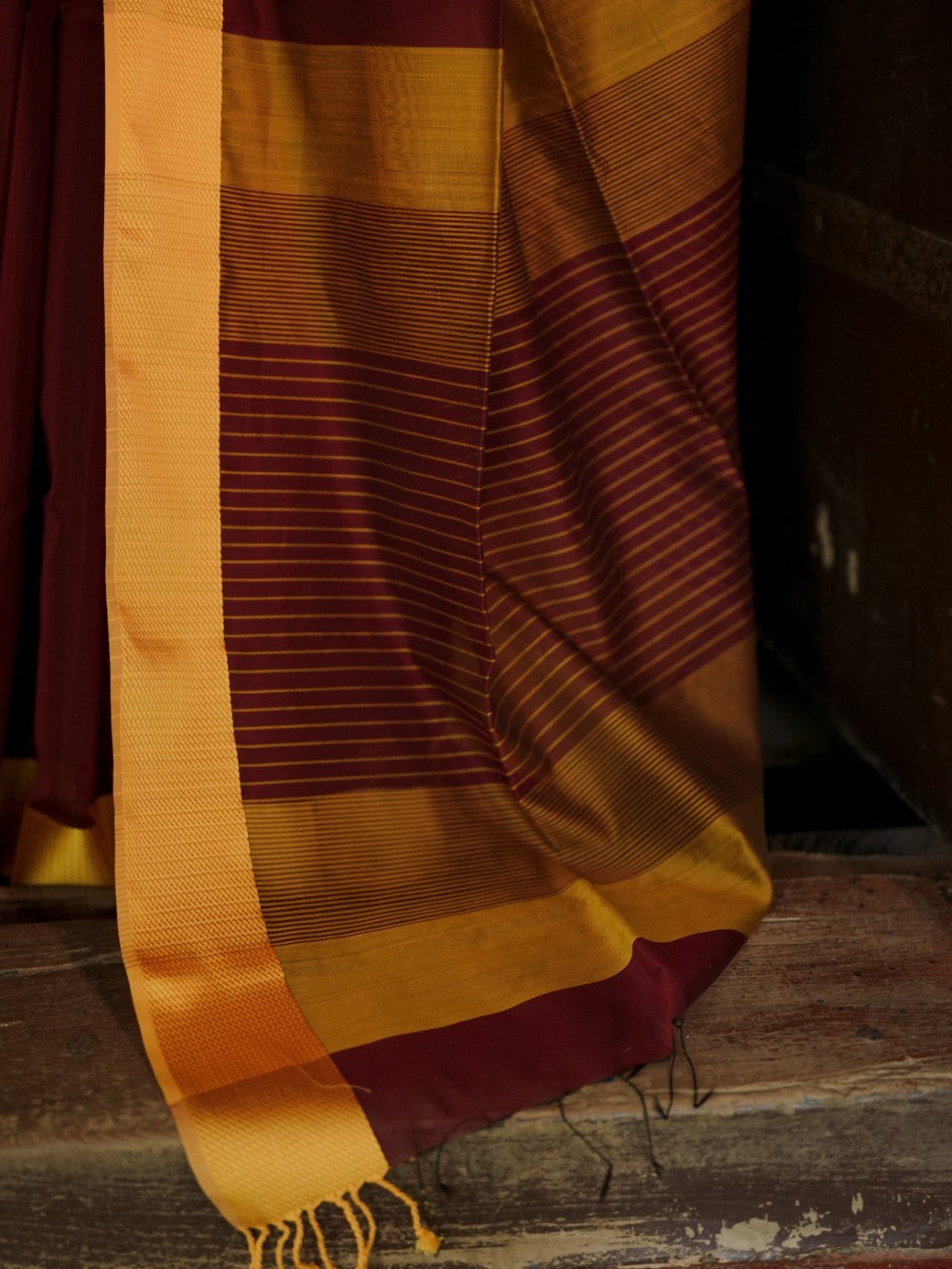 Maroon and yellow maheshwari with resham border