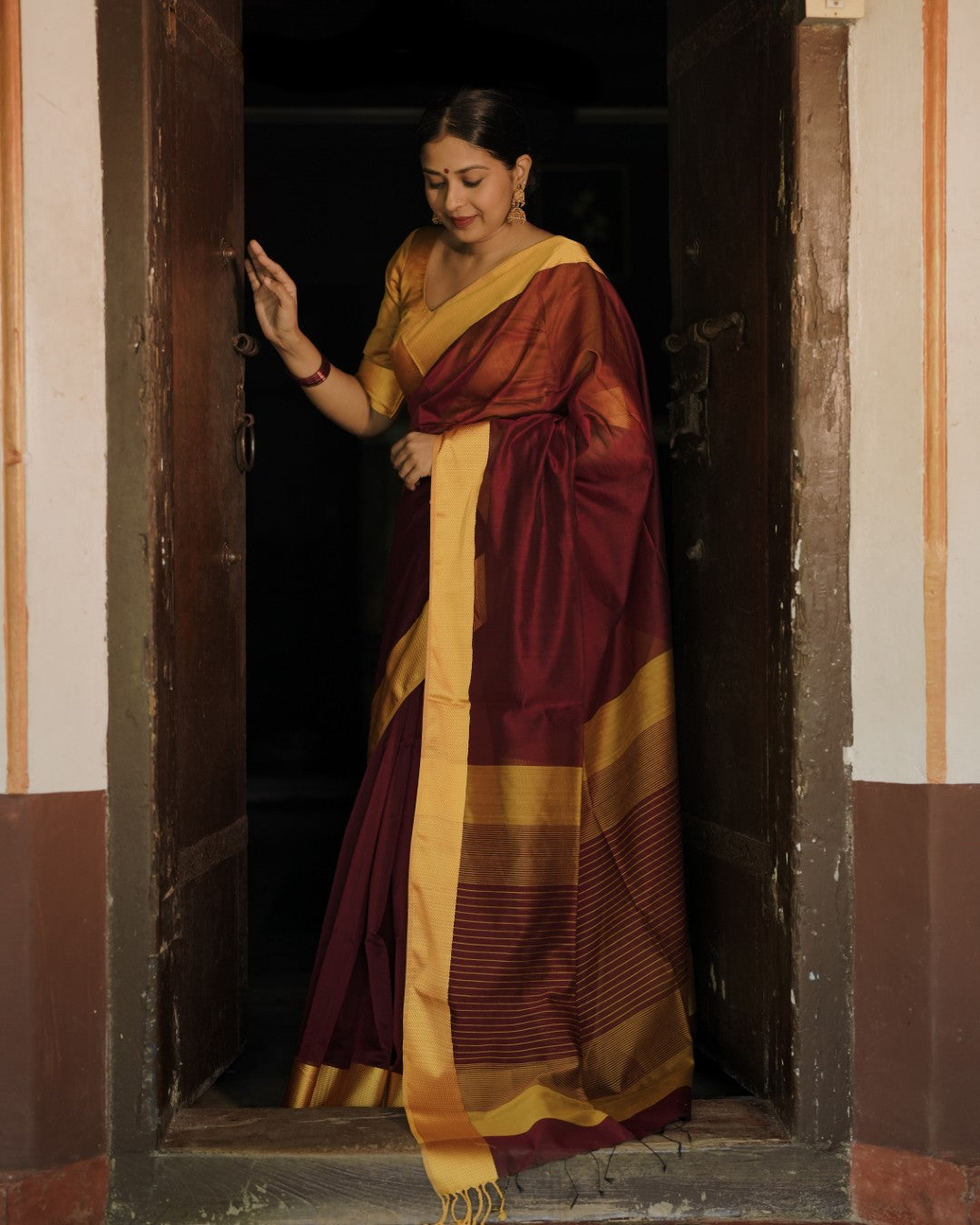 Maroon and yellow maheshwari with resham border