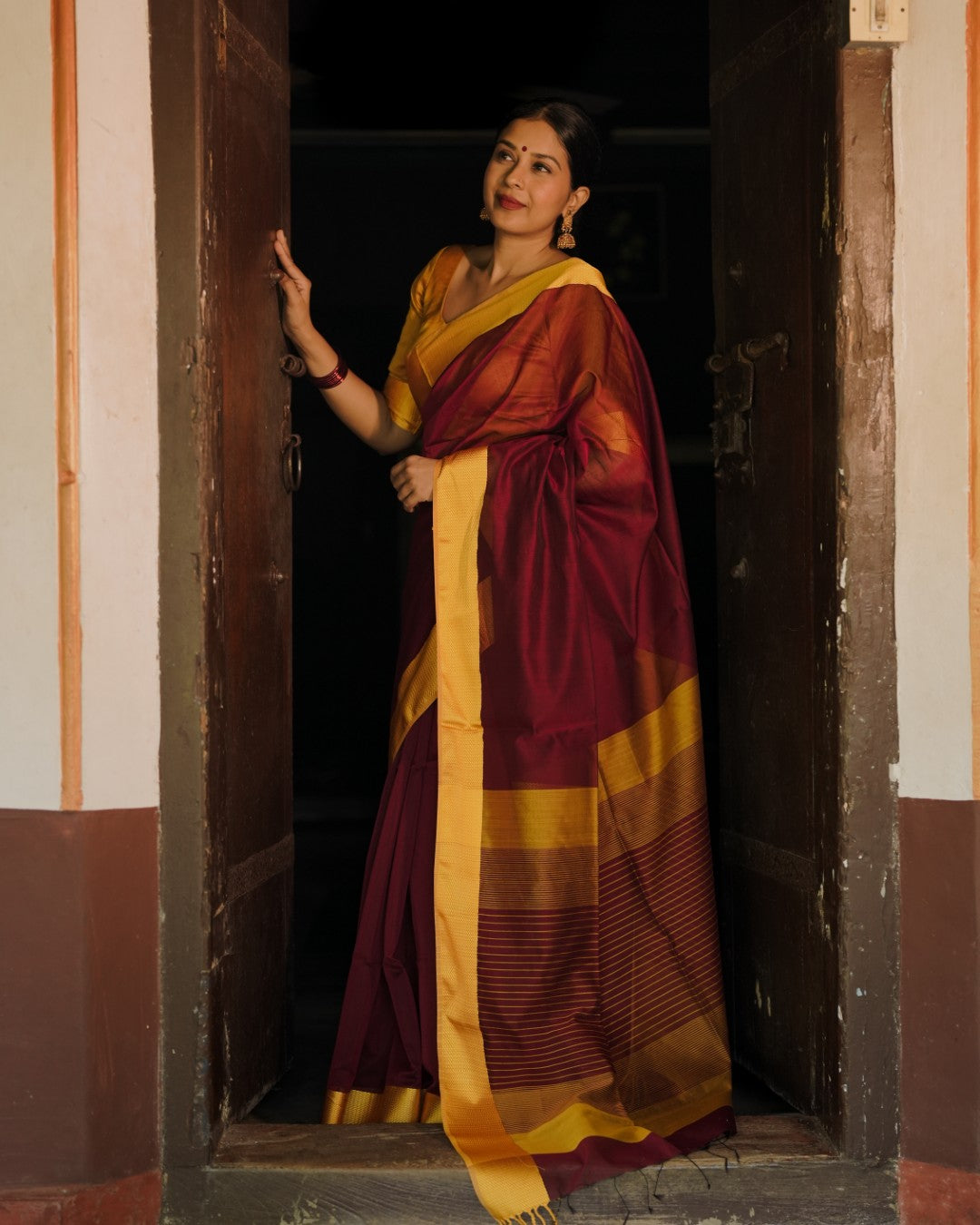 Maroon and yellow maheshwari with resham border
